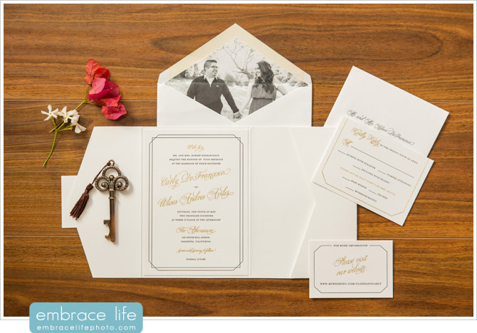 Custom gold foil wedding invitations with envelopes featuring photo liners