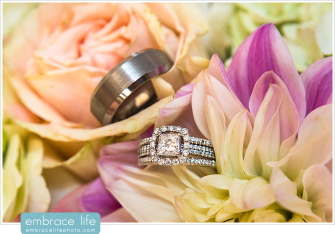 Wedding rings in floral centerpieces created by Floral Fields