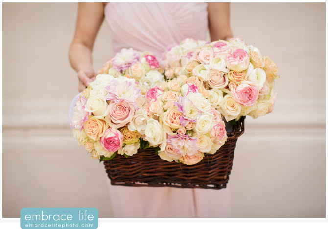 Bridesmaids bouquets created by Floral Fields displayed in wicker basket
