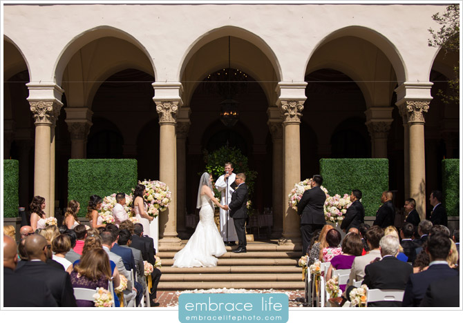 Midday wedding ceremony on the stairs at Athenaeum