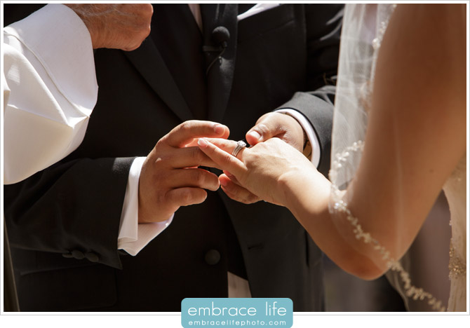 Bride and Groom exchanging wedding rings during ceremony