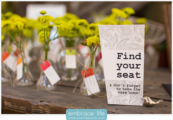 Wedding Escort Cards Tied to Flower Vase